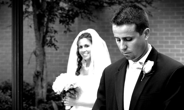 Bride Looking at Pensive Groom