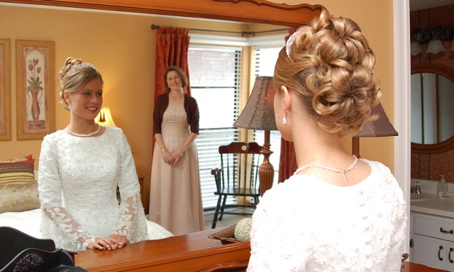 Bride Looking in Mirror