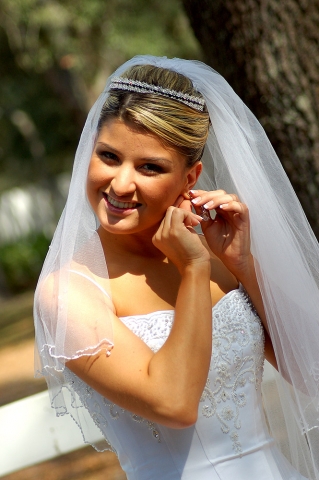 Maria Fixing Her Earing